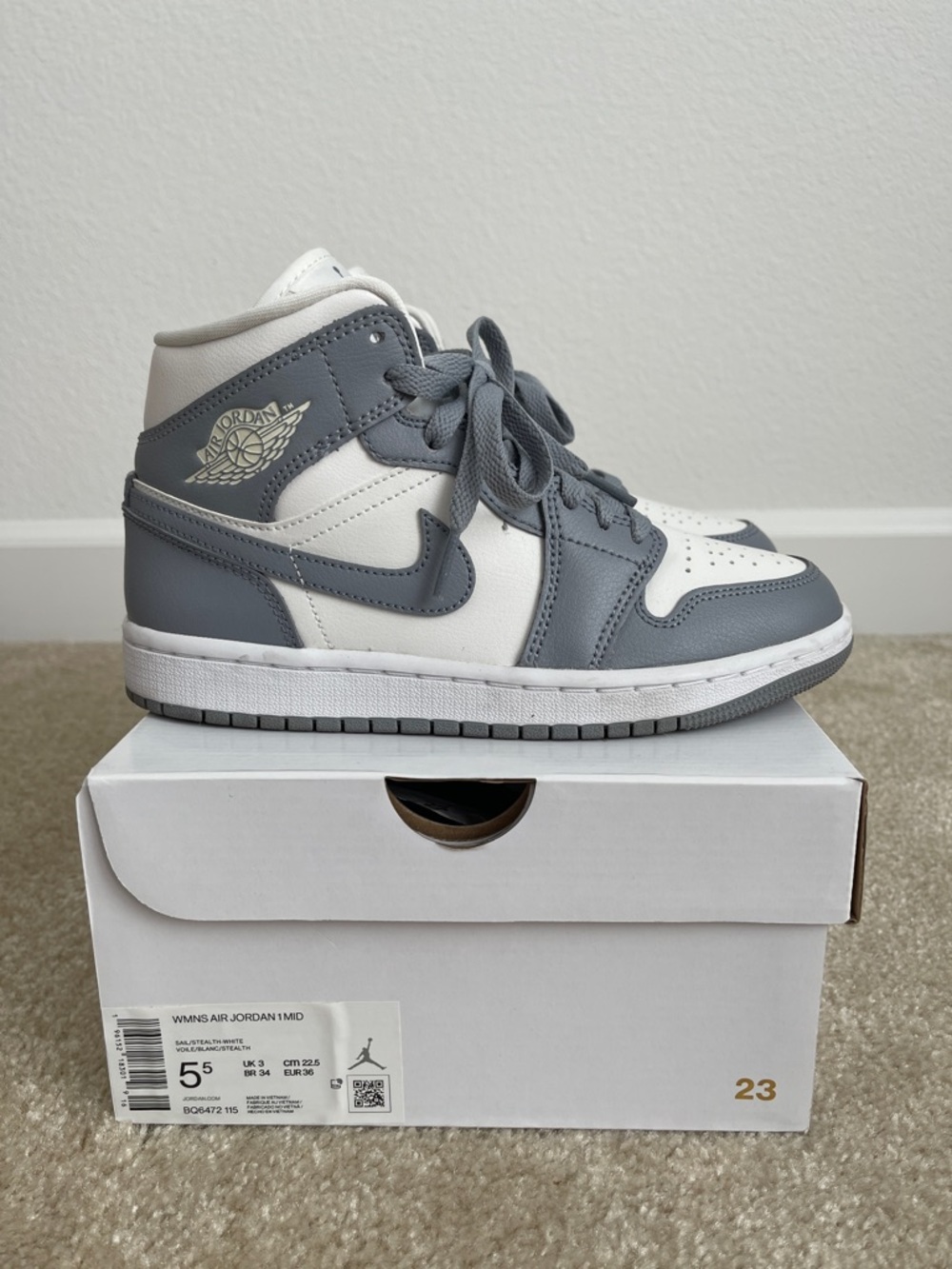 Air Jordan 1 Mid-Top Sneaker in Sail/Stealth White Women’s Size 5.5